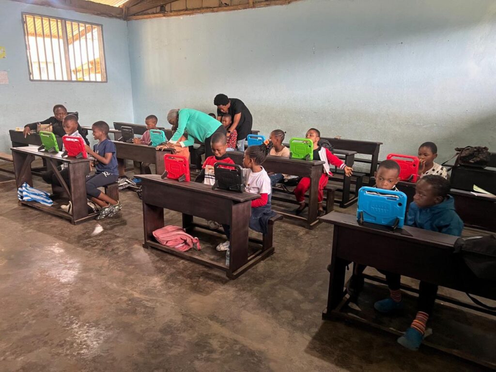 Bridging the Digital Divide: How PMS Buea & DELC Foundation Are Revolutionizing Learning With (1 & 0's) young African learning digital skills