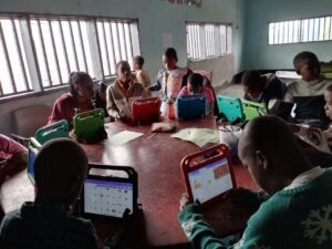 young African learning digital skills